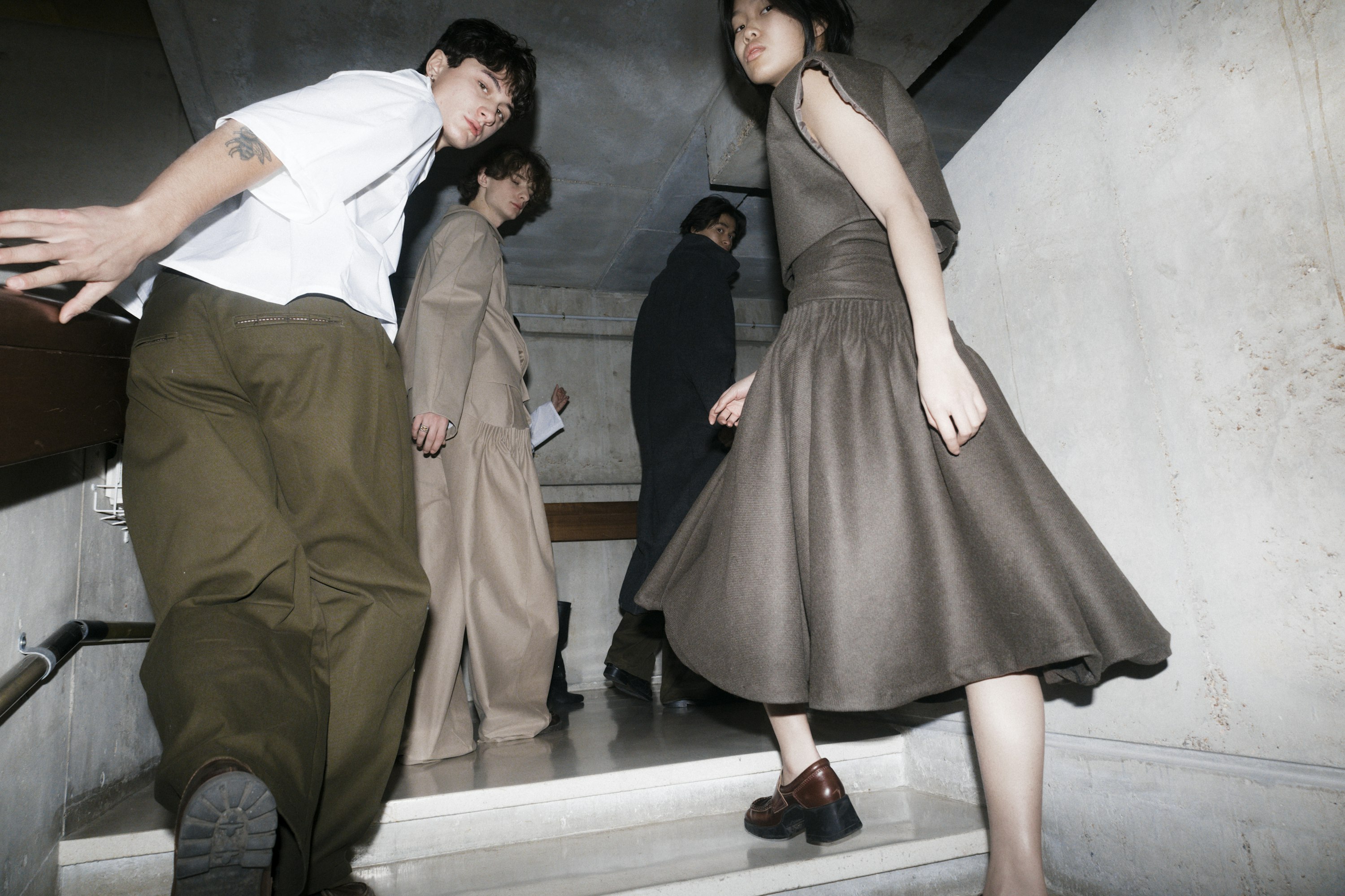 Well-dressed group arriving at an upscale gathering